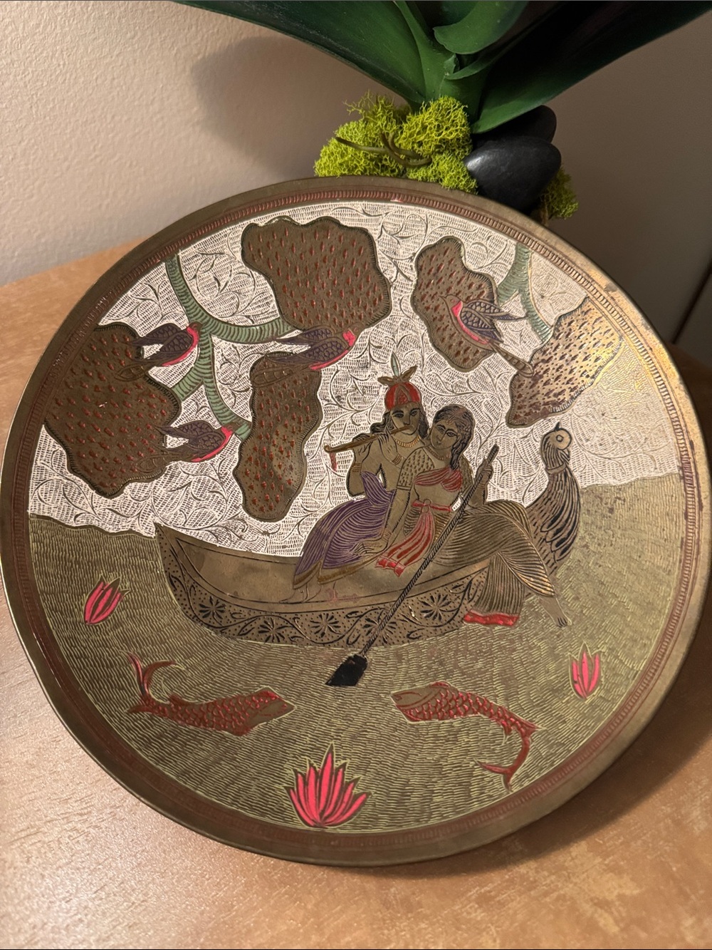 Vintage metal and enamel plate of couple in a gondola.